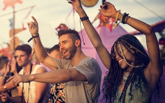 couple dancing at a summer music festival 