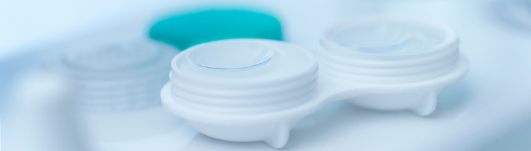 contact lenses in lens case with solution filled to top
