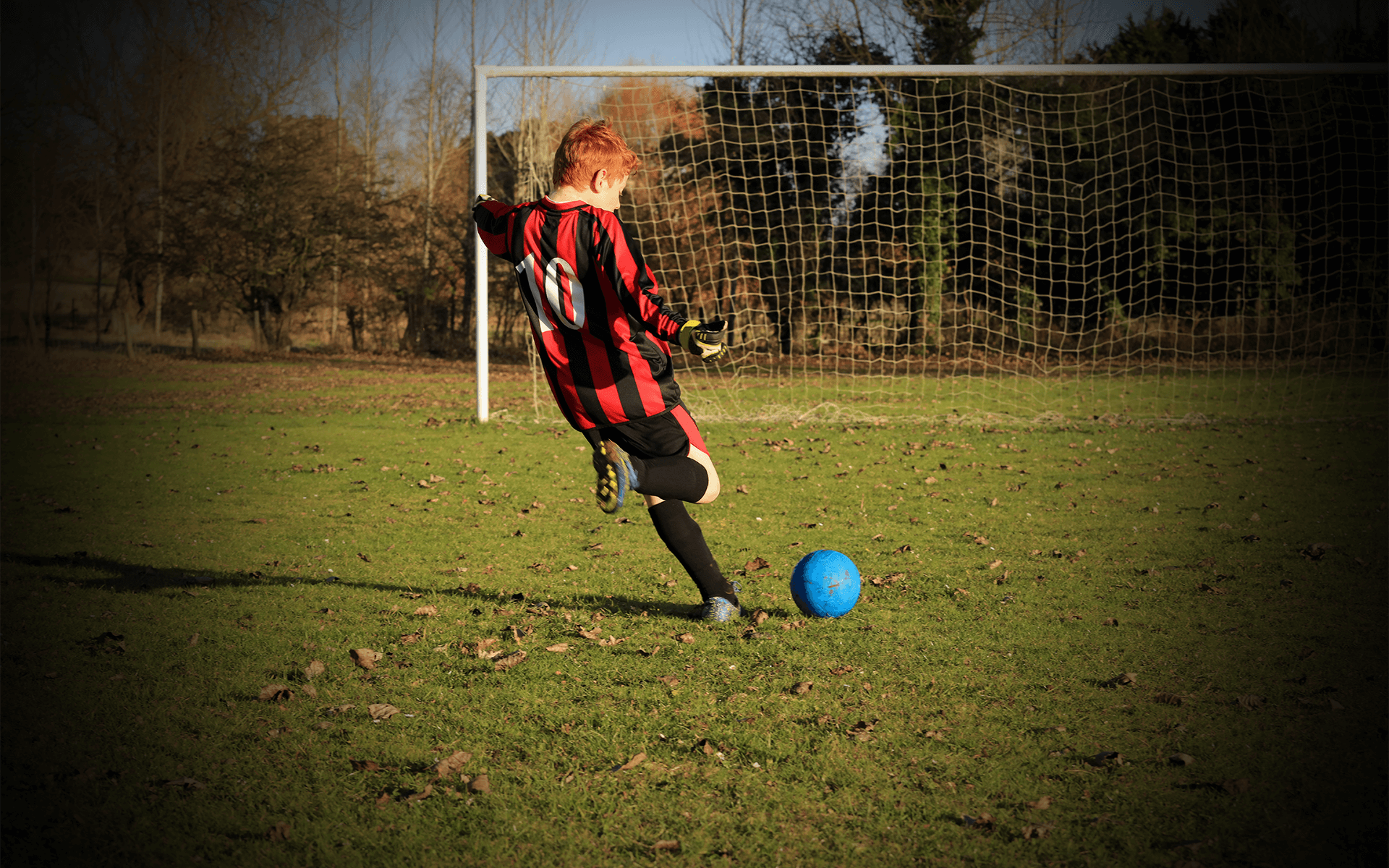 Boy playing football advanced glaucoma