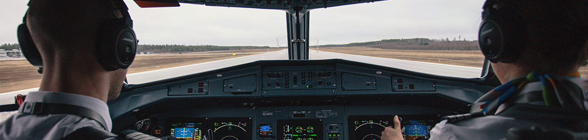 Pilots in aircraft cabin