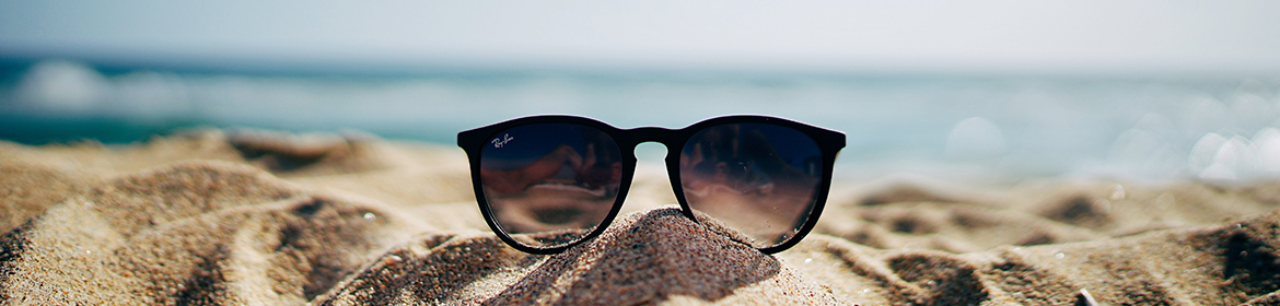 Sunglasses in the sand