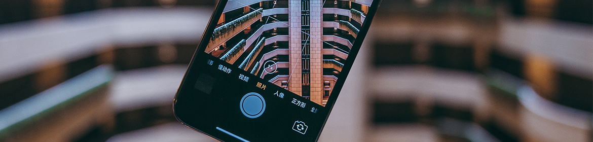 View through a phone camera of buildings