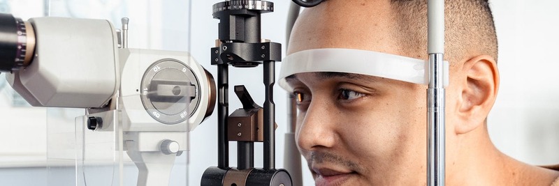 Man having his eyes examined