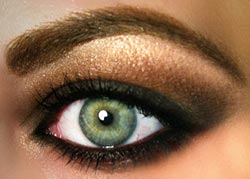 Close up of green smoky eye makeup