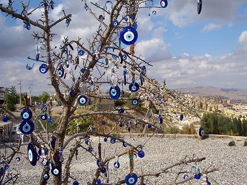Glass amulets hung in a tree to protect against the evil eye
