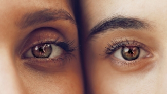 two faces side by side, close up on eyes
