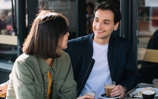 man-woman-on-coffee-date-talking