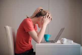 Women stressed at computer