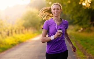 woman in purple shirt running