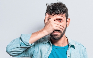man with pink eye red