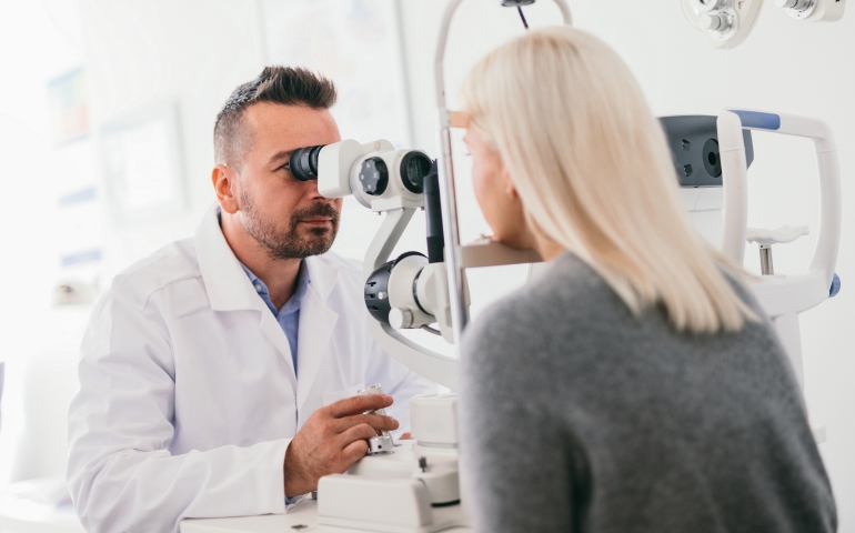 Optician Performing an eye tests