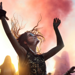 Woman dancing at music festival