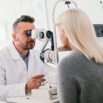 Optician Performing an eye tests