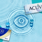 Water drop forming the shape on an eye with packshots for dry eye